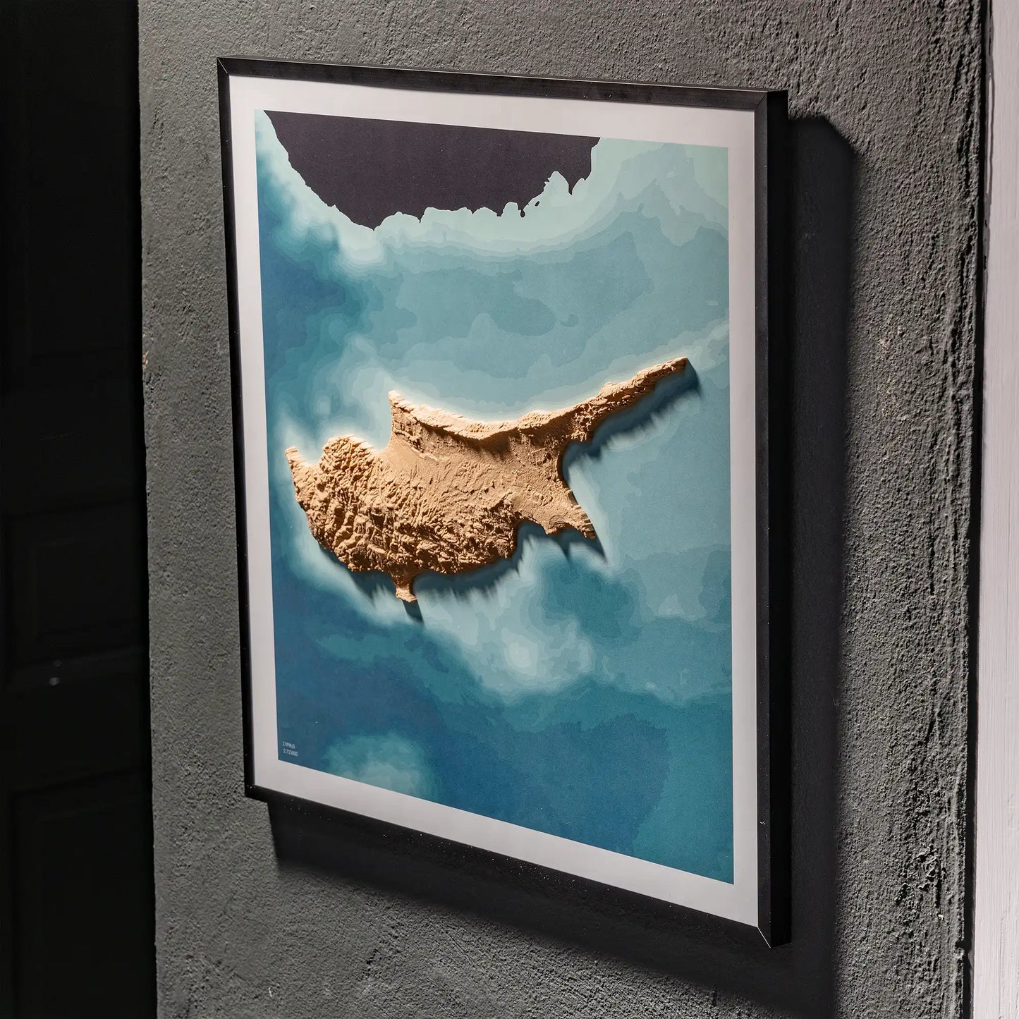 3D  topographic map of Cyprus in black frame, wall display – TerraFrames