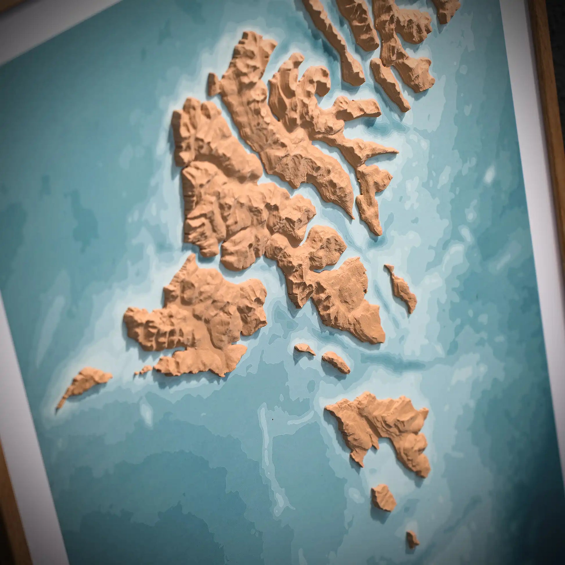 3D closeup of a topographic map of the Faroe Islands on a light blue background – TerraFrames