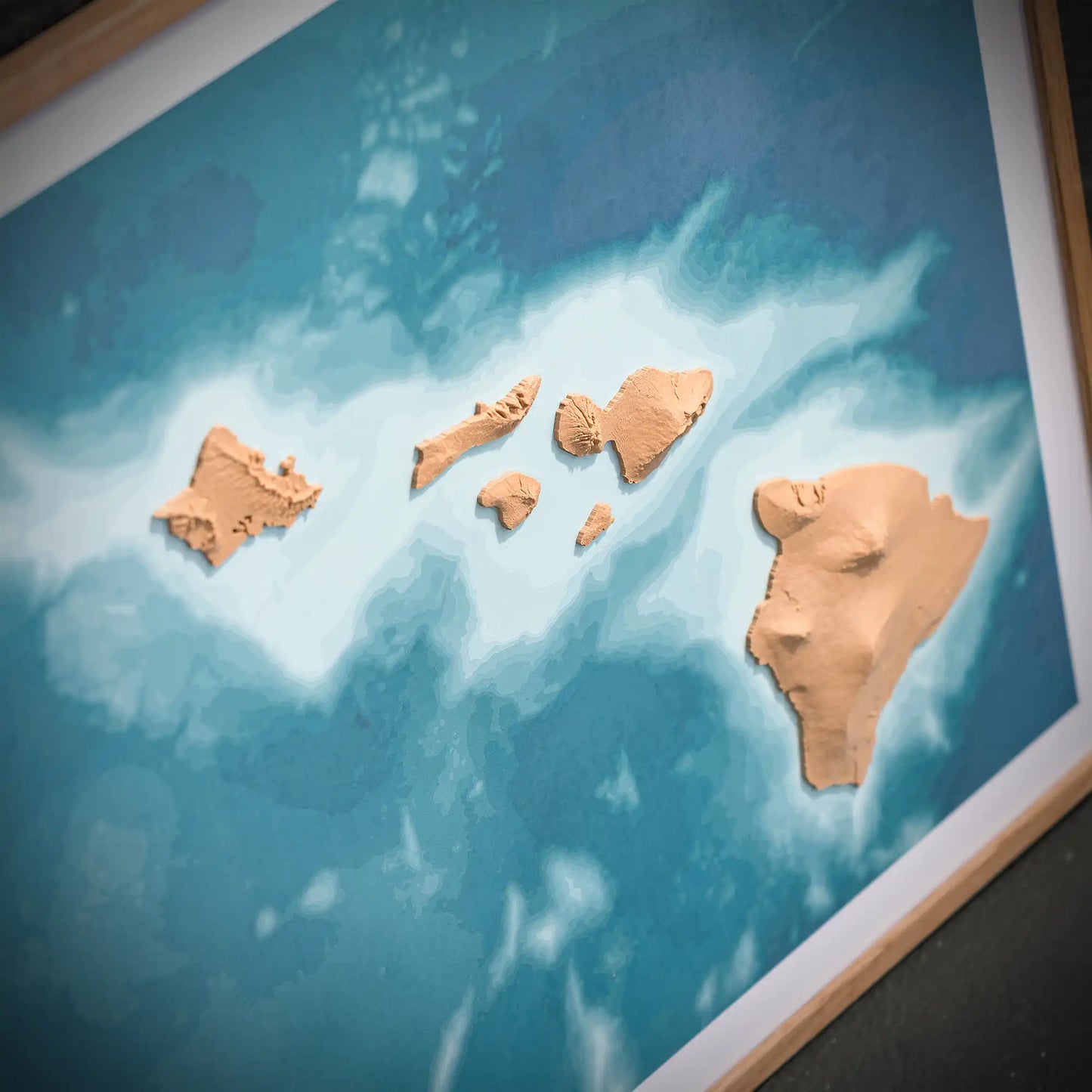 3D closeup of a topographic map of Hawaii on a light blue background – TerraFrames