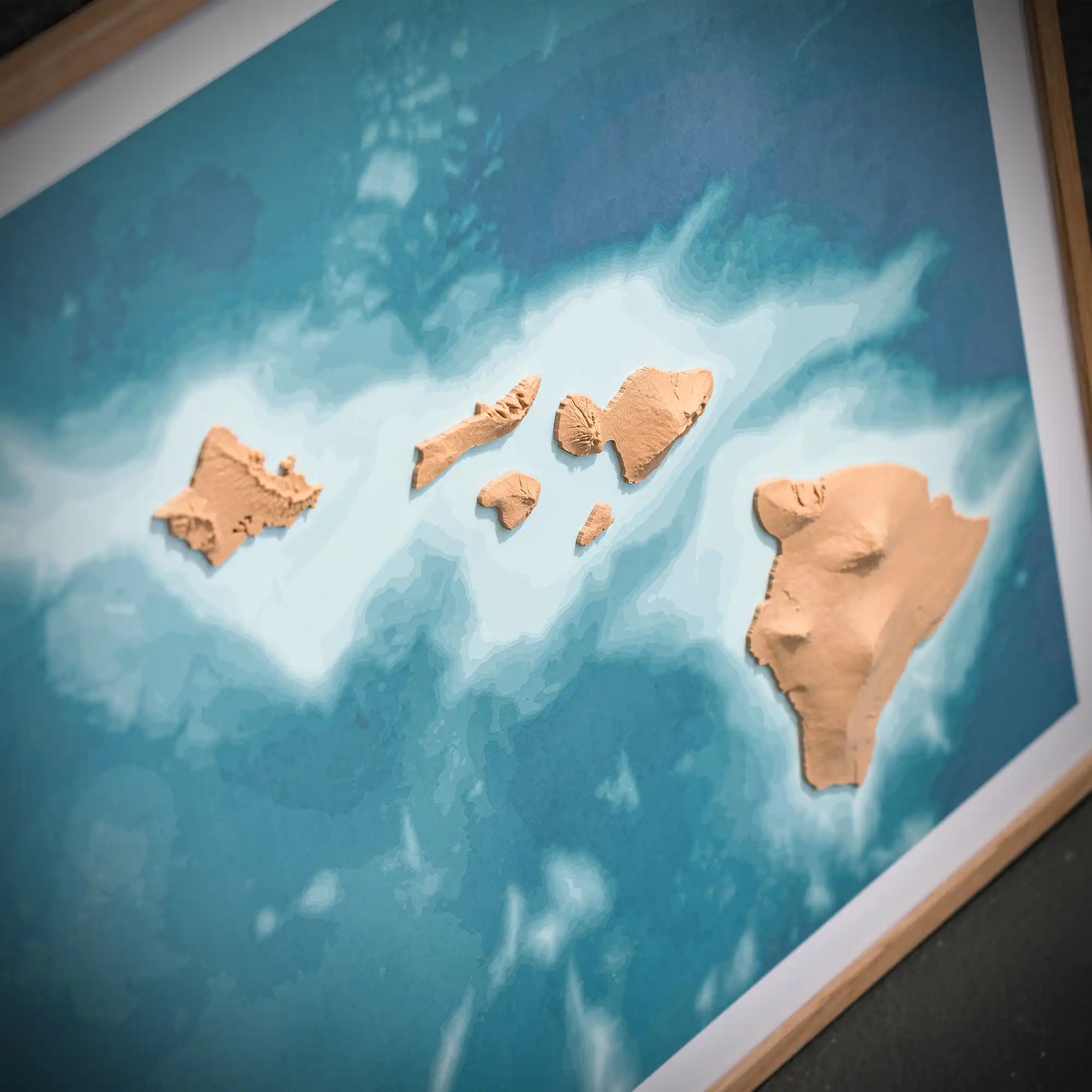3D closeup of a topographic map of Hawaii on a light blue background – TerraFrames