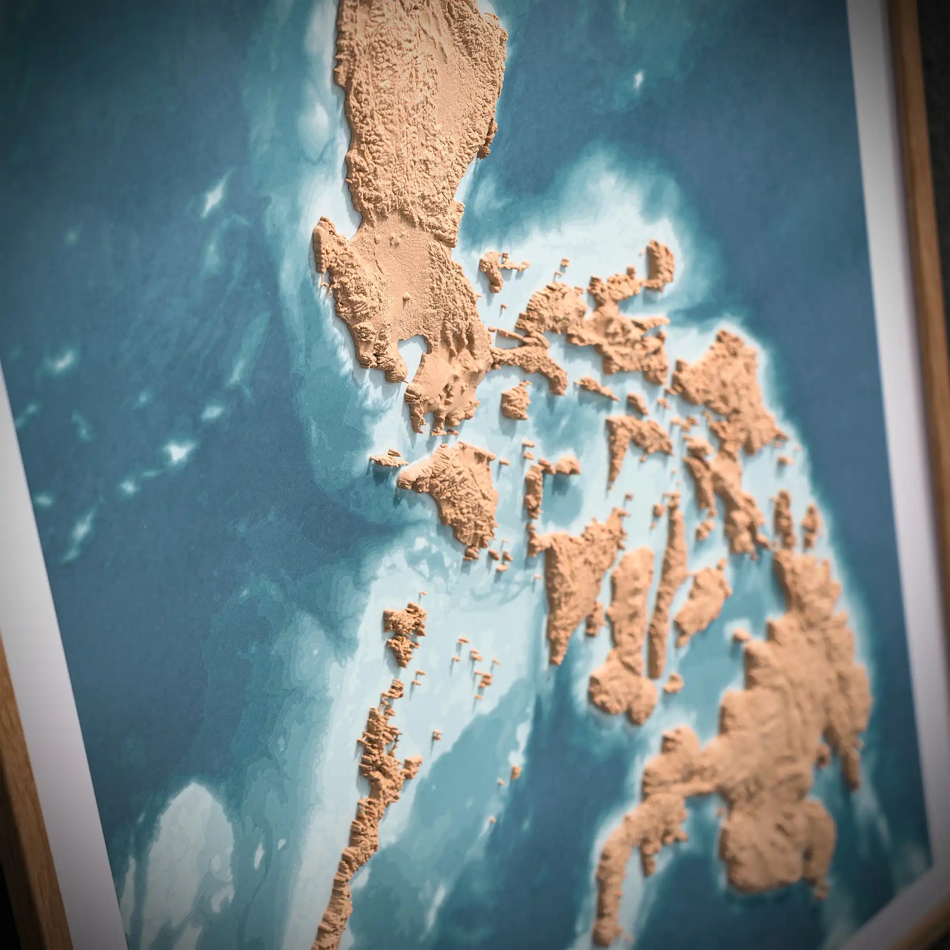 3D closeup of a topographic map of the Philippines on a light blue background – TerraFrames