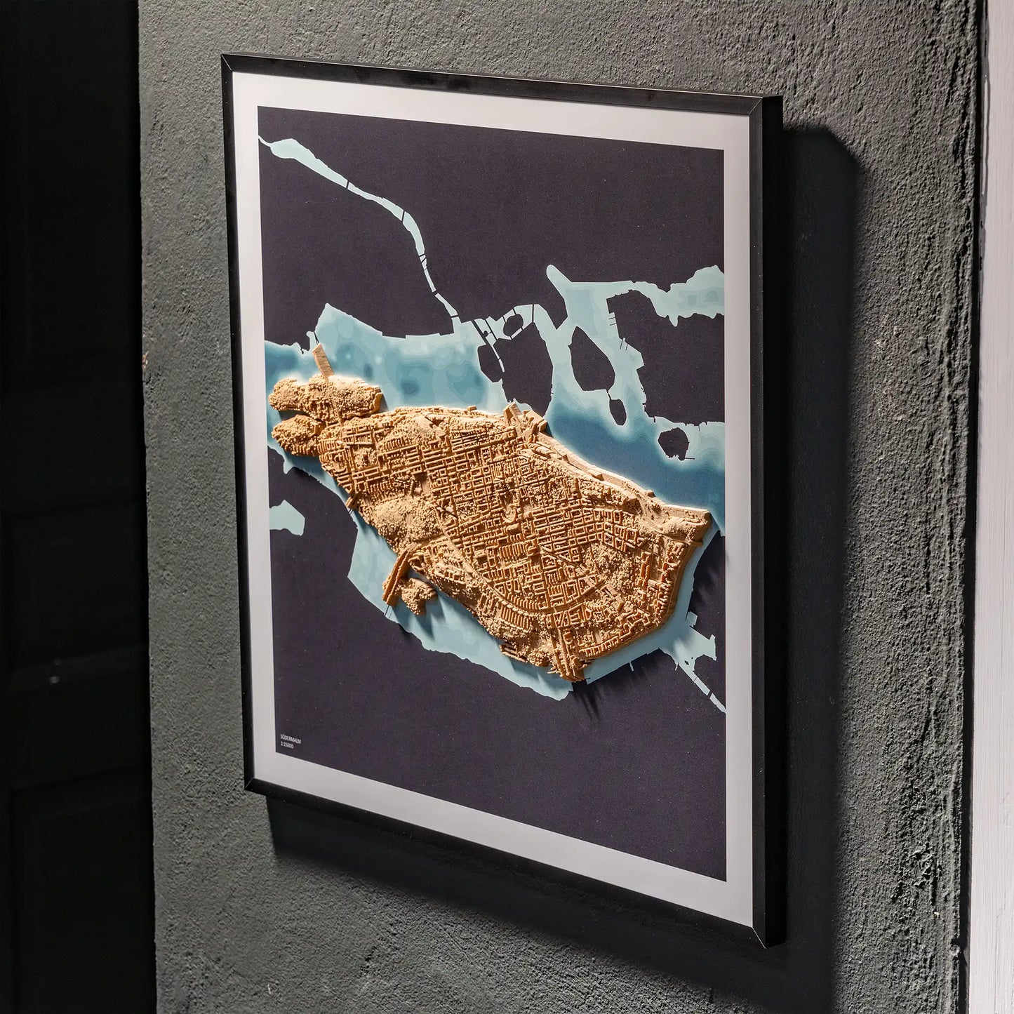 3D  topographic map of Södermalm in black frame, wall display – TerraFrames