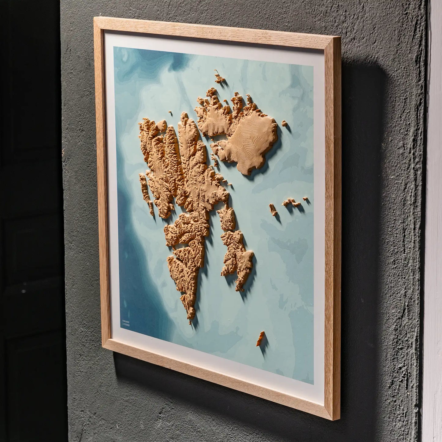 3D  topographic map of Svalbard in oak frame, wall display – TerraFrames