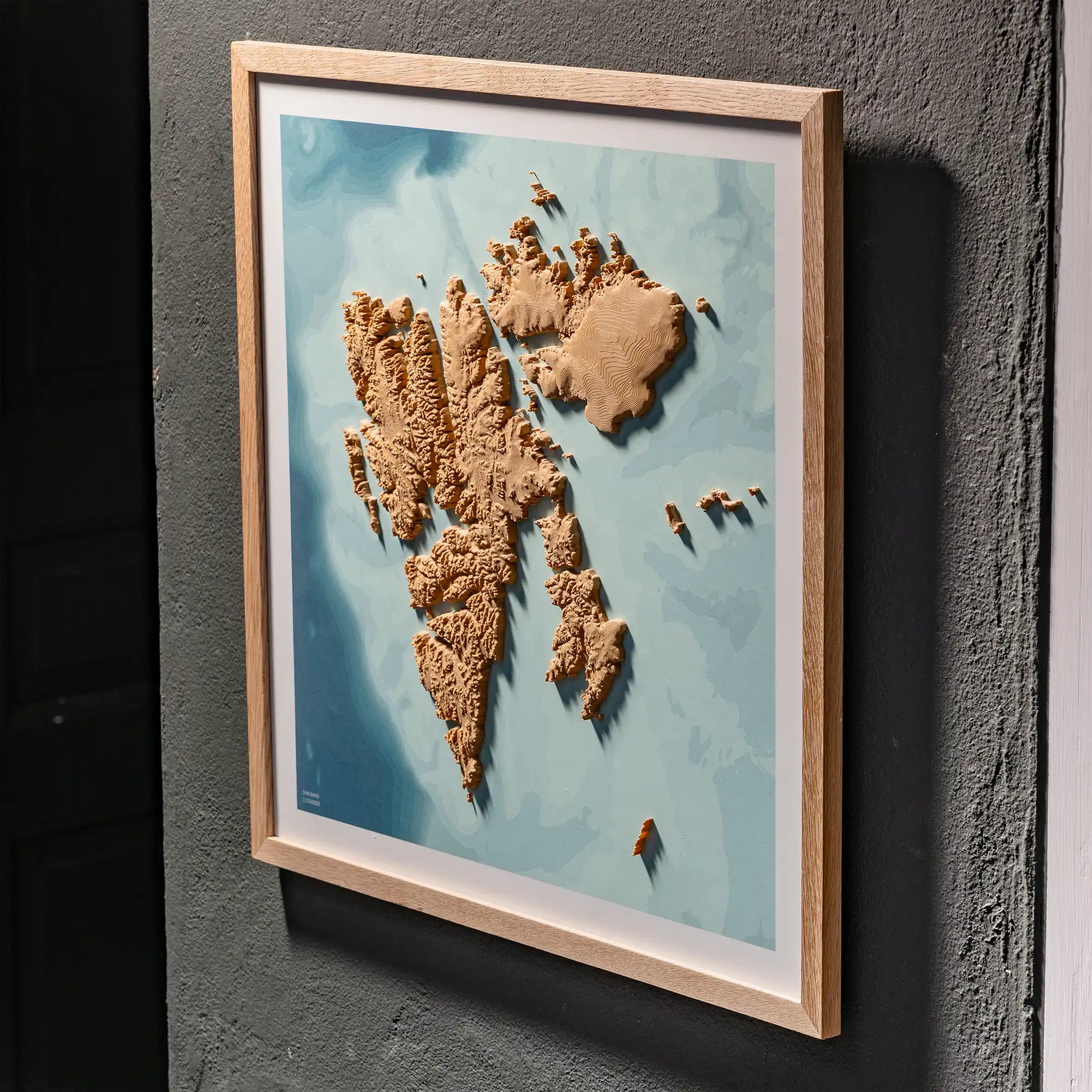 3D  topographic map of Svalbard in oak frame, wall display – TerraFrames